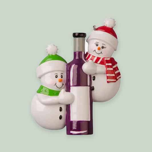 Wine Bottle Snowman Couple ornament on a sage green background