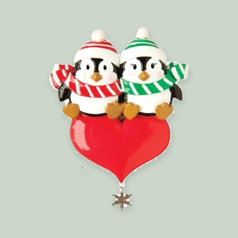 Penguin Couple on Red Heart with Snowflake ornament on a sage green background