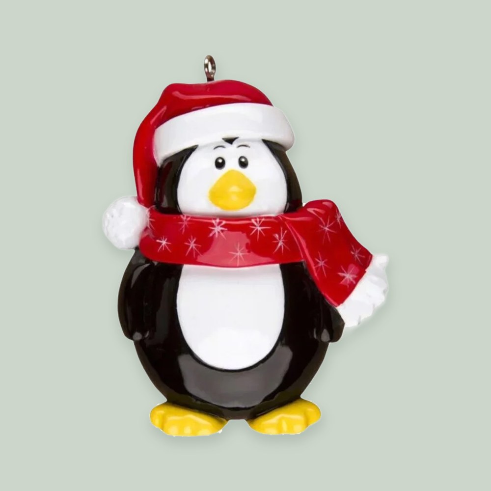 Penguin Character ornament on a sage green background