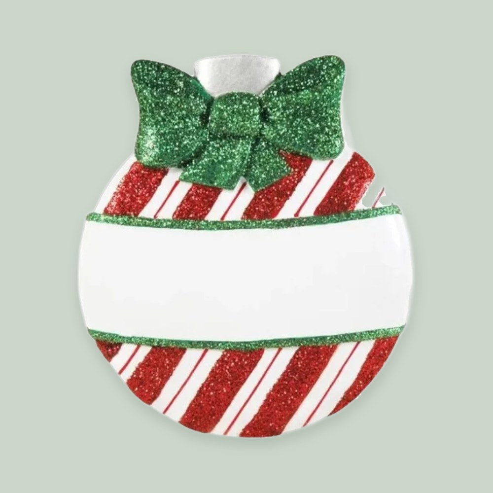 Striped Christmas Bauble with Green Bow ornament on a sage green background