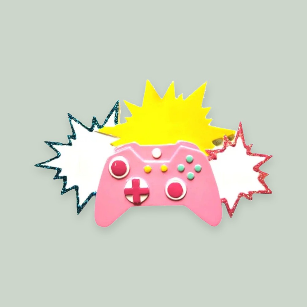 Video Gamer Christmas Ornament (Pink) ornament on a sage green background