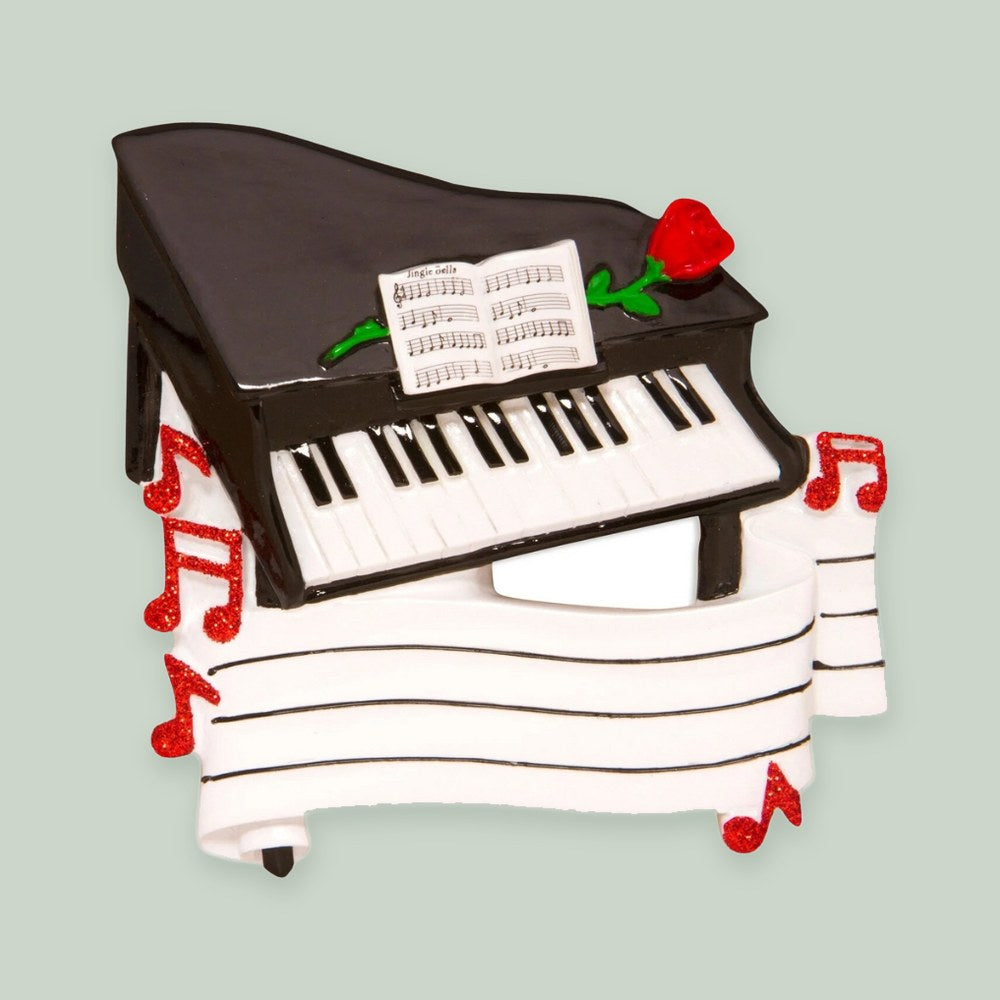 Piano ornament on a sage green background