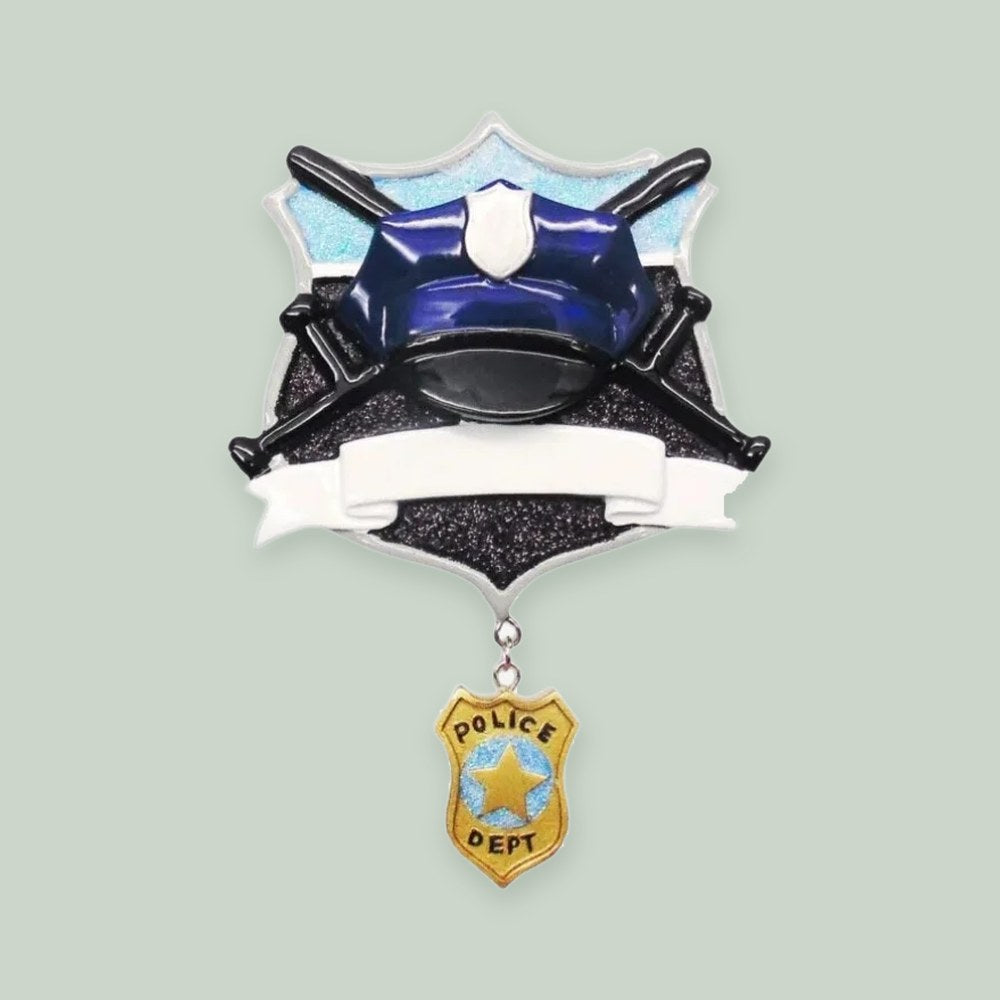 Police Hat and Badge ornament on a sage green background