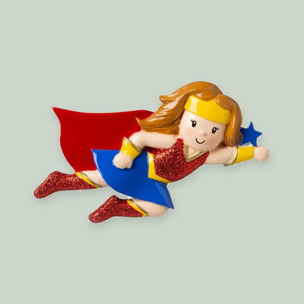 Super Hero Girl ornament on a sage green background