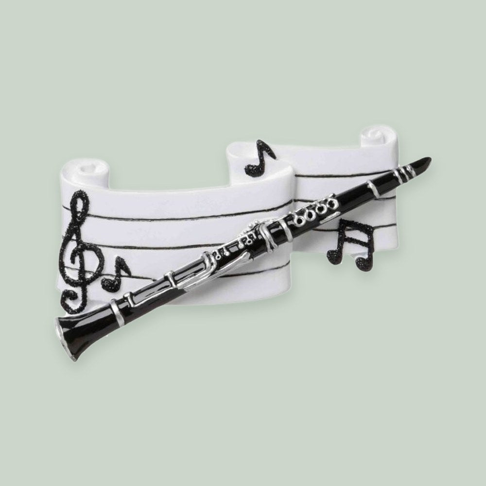 Clarinet ornament on a sage green background