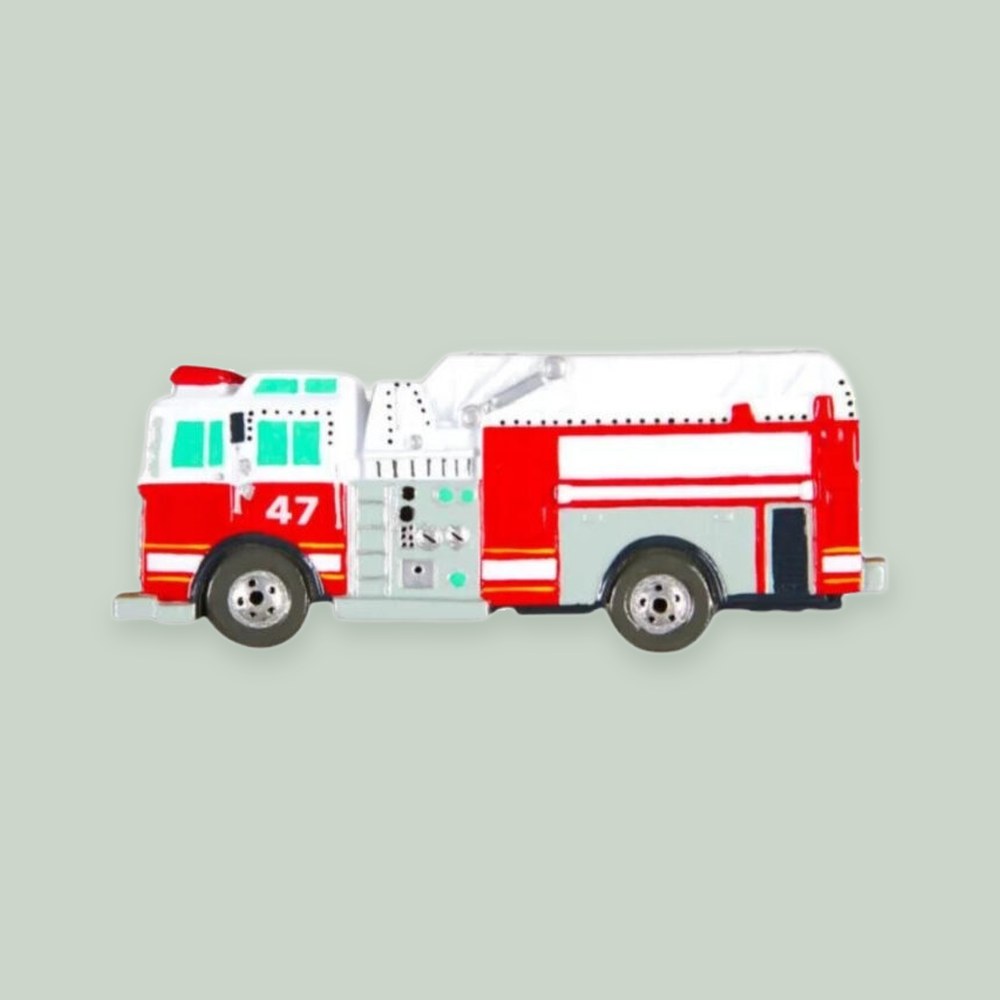 Firetruck ornament on a sage green background
