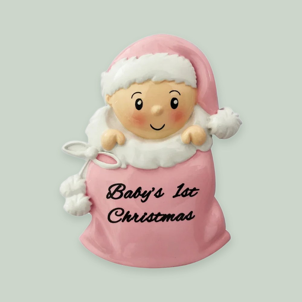 Baby Girl In Santa Sack- Pink ornament on a sage green background