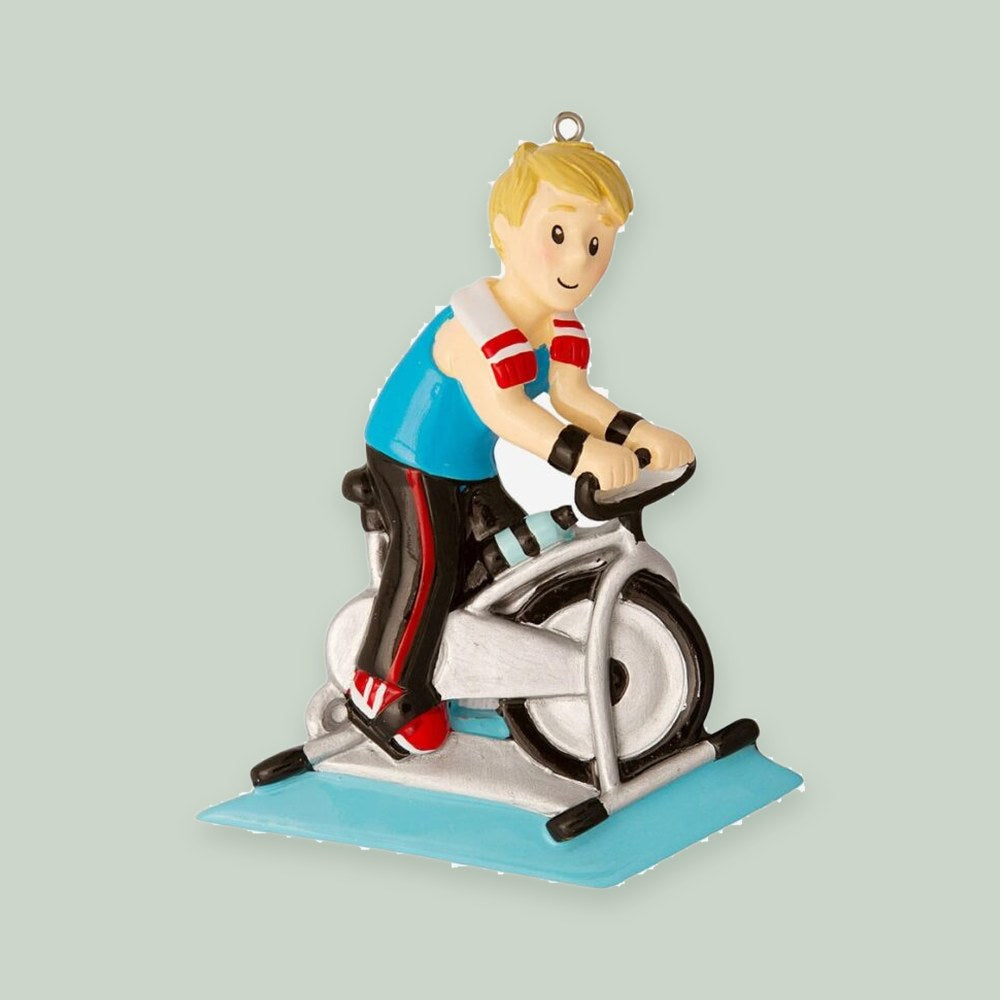 Spinning Class — Man ornament on a sage green background