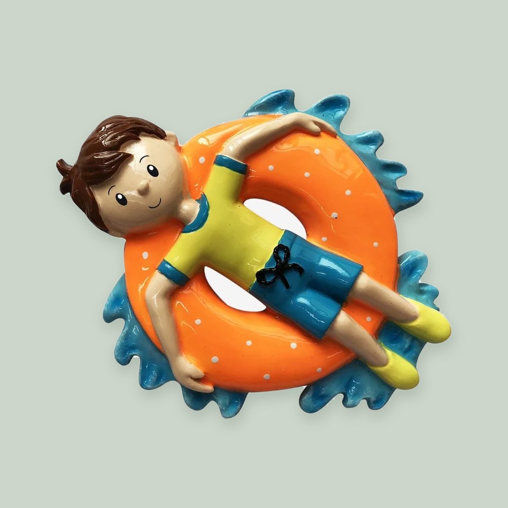 Boy on Inner Tube ornament on a sage green background