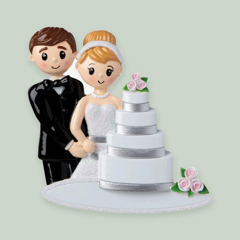 Wedding Couple with Cake ornament on a sage green background