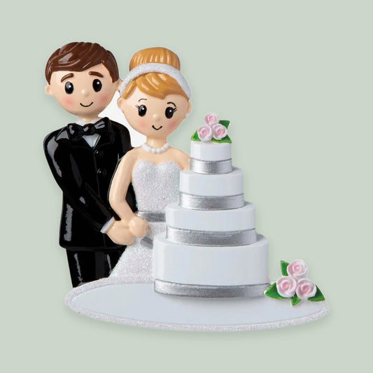 Wedding Couple with Cake ornament on a sage green background