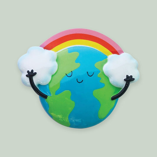 Rainbow With Clouds ornament on a sage green background