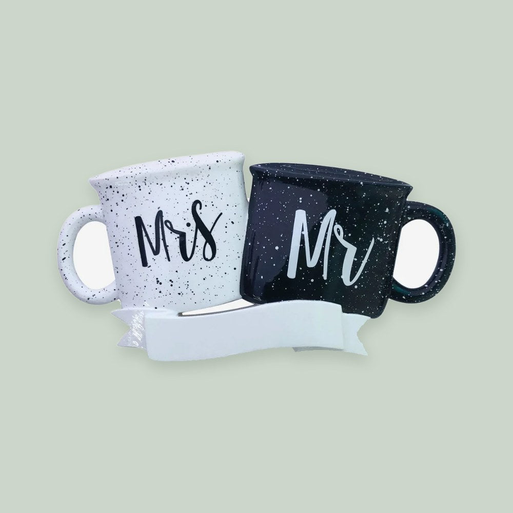 Mr. and Mrs. Mugs ornament on a sage green background