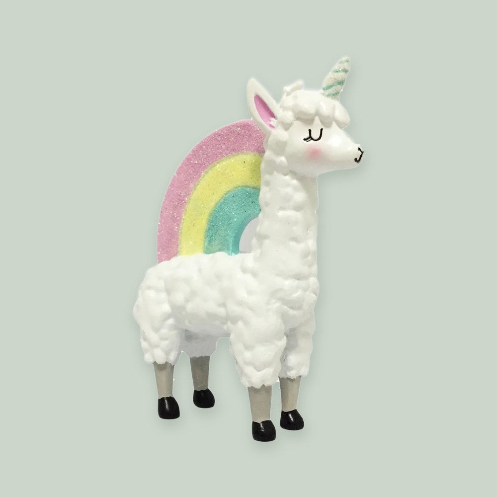 Llamacorn ornament on a sage green background