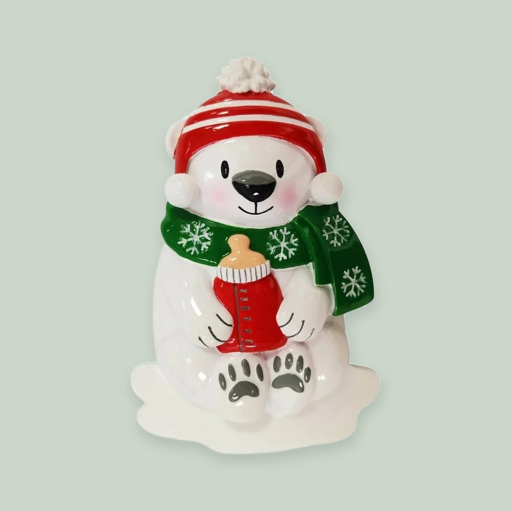 Baby Polar Bear (Red & Green) ornament on a sage green background