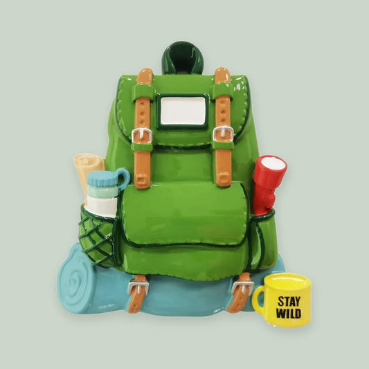 Hiking Backpack “Stay Wild” ornament on a sage green background