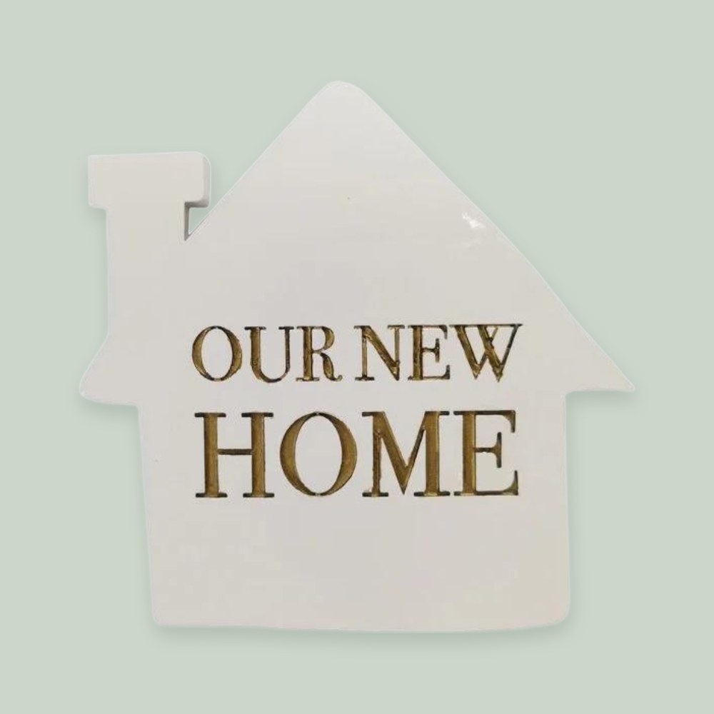 Our New Home ornament on a sage green background