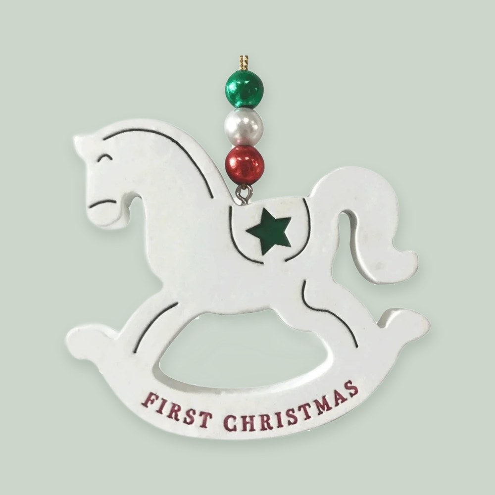 My First Christmas Pony ornament on a sage green background
