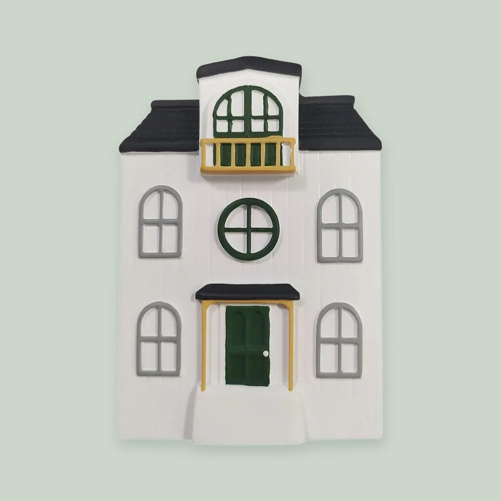 3D Doll House ornament on a sage green background
