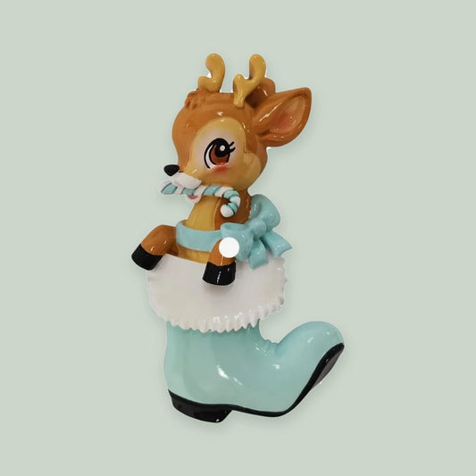 Nostalgic Baby Deer in Boot (Blue) ornament on a sage green background