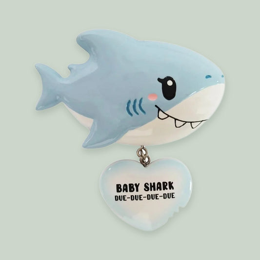 Baby Shark (Blue) ornament on a sage green background