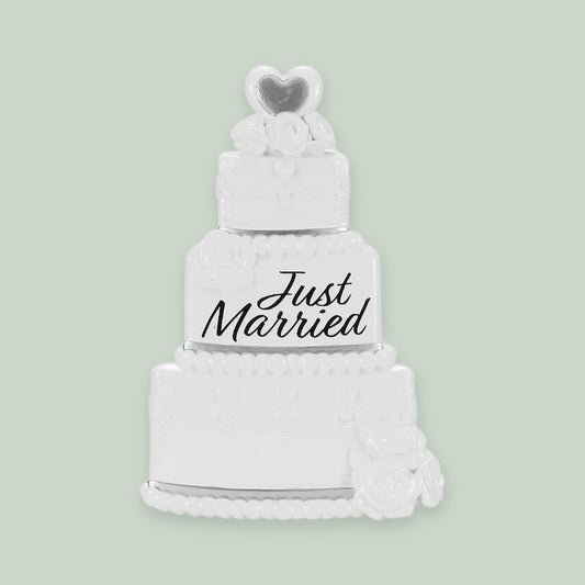 Just Married Wedding Cake ornament on a sage green background