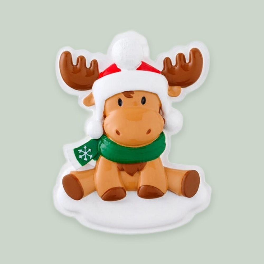 Moose Baby (Red & Green) ornament on a sage green background
