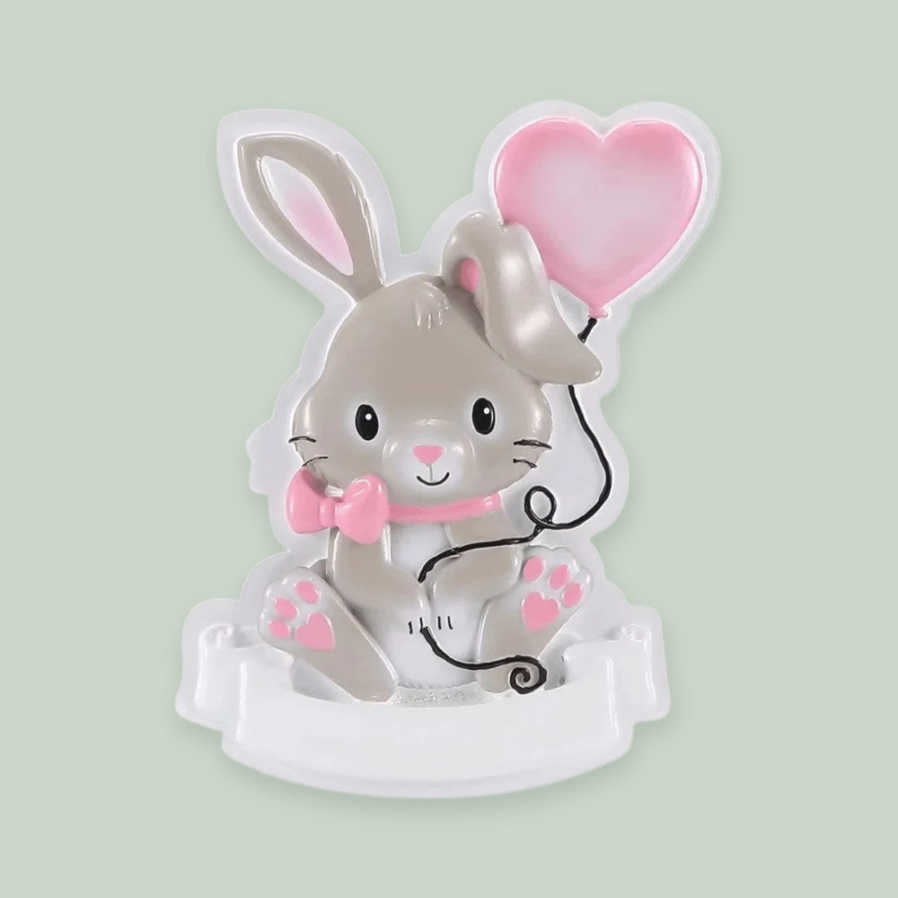 Cutesy Bunny (Pink) ornament on a sage green background