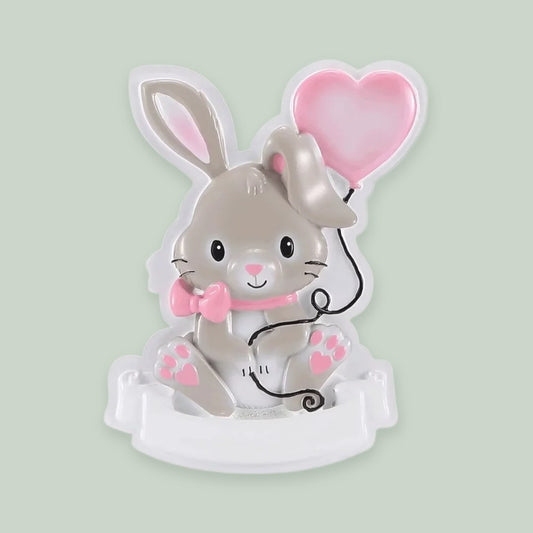 Cutesy Bunny (Pink) ornament on a sage green background