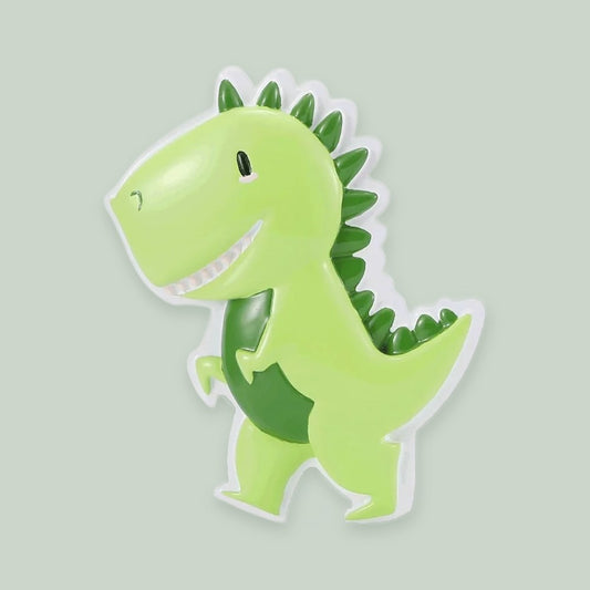 Cutesy Green Dino ornament on a sage green background