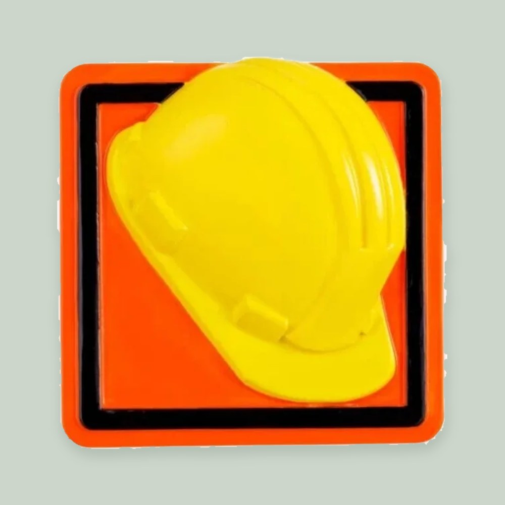 Hard Hat ornament on a sage green background
