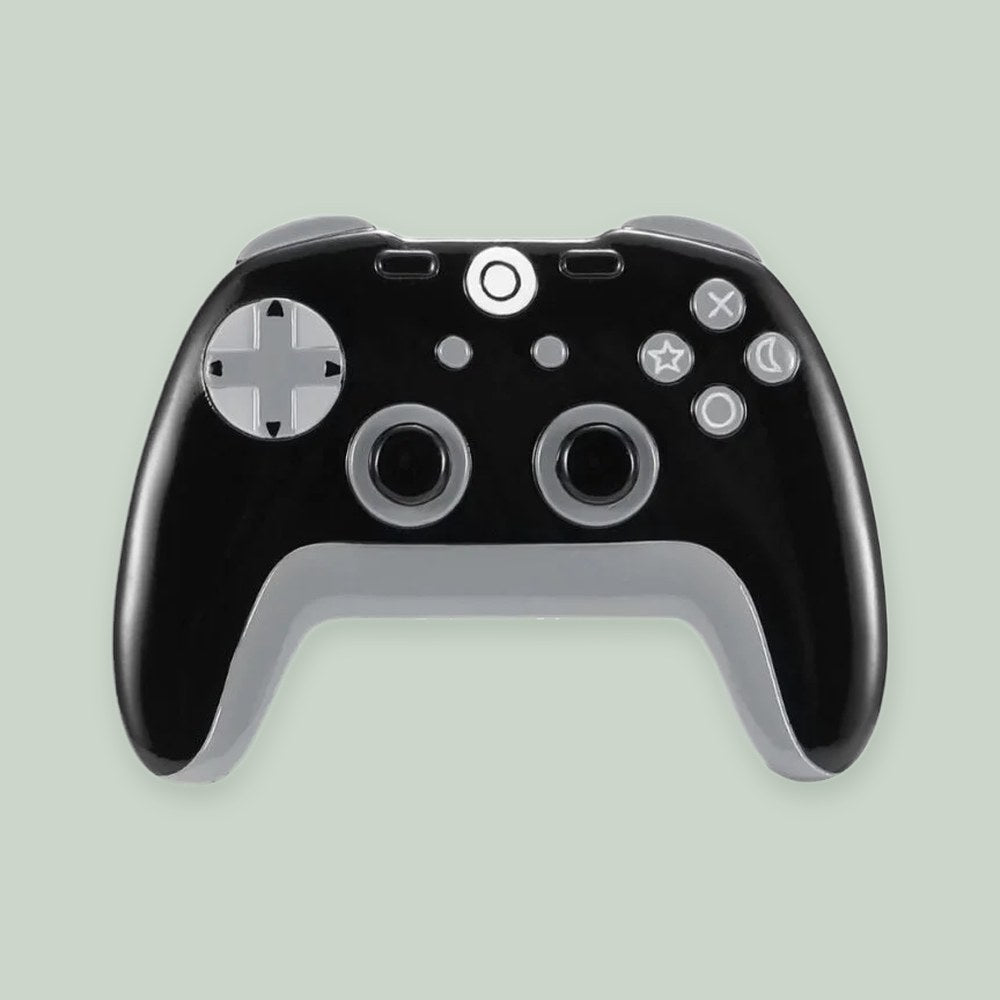Black Controller ornament on a sage green background