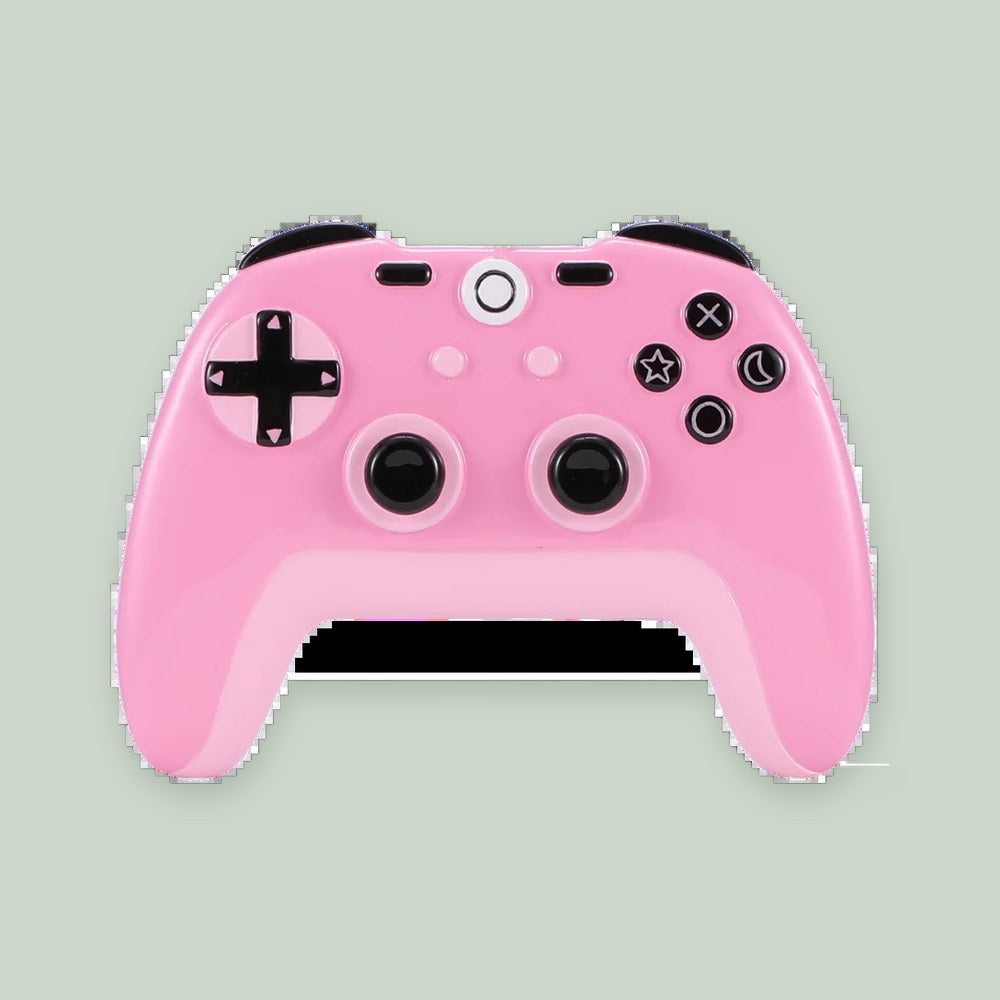 Pink Controller ornament on a sage green background