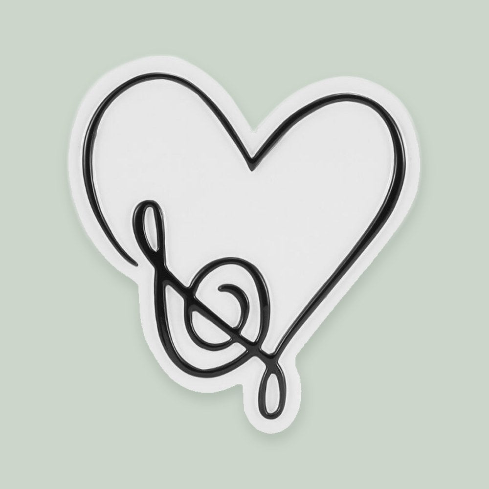 Music Note Heart ornament on a sage green background