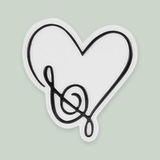 Music Note Heart ornament on a sage green background