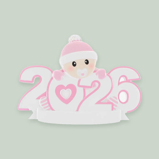 Baby's First Christmas 2026 — Pink ornament on a sage green background