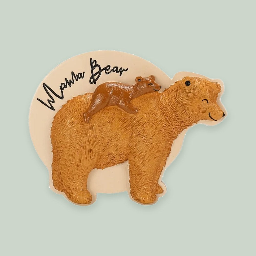 Mama bear ornament on a sage green background