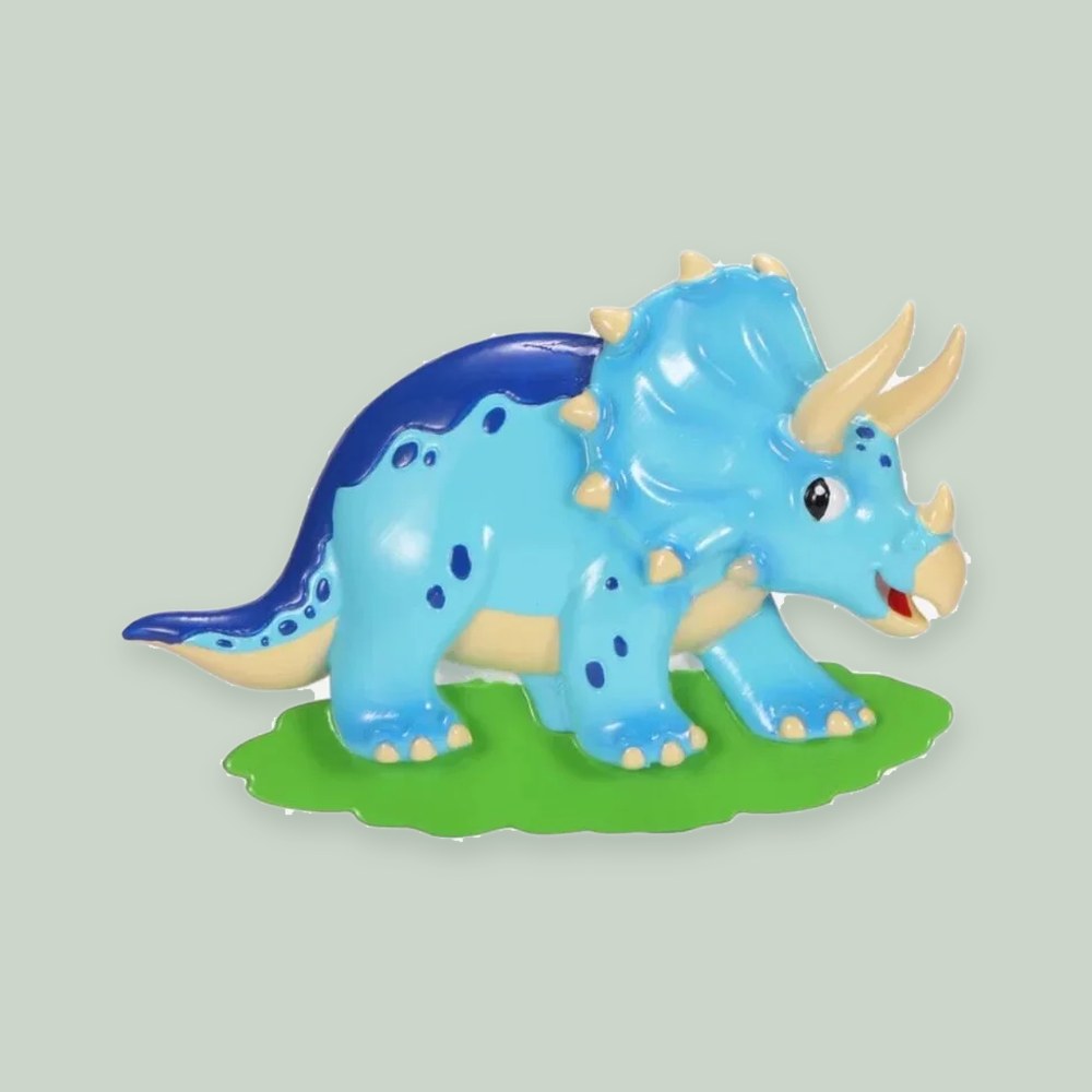 Triceratops ornament on a sage green background