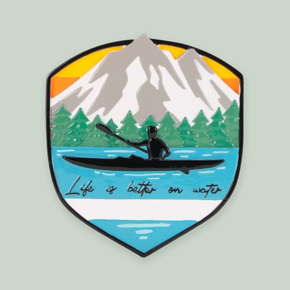 Adventure Badge Kayaking ornament on a sage green background