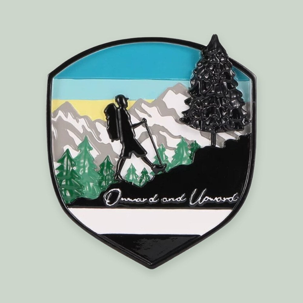 Adventure Badge Climbing/Hiking ornament on a sage green background