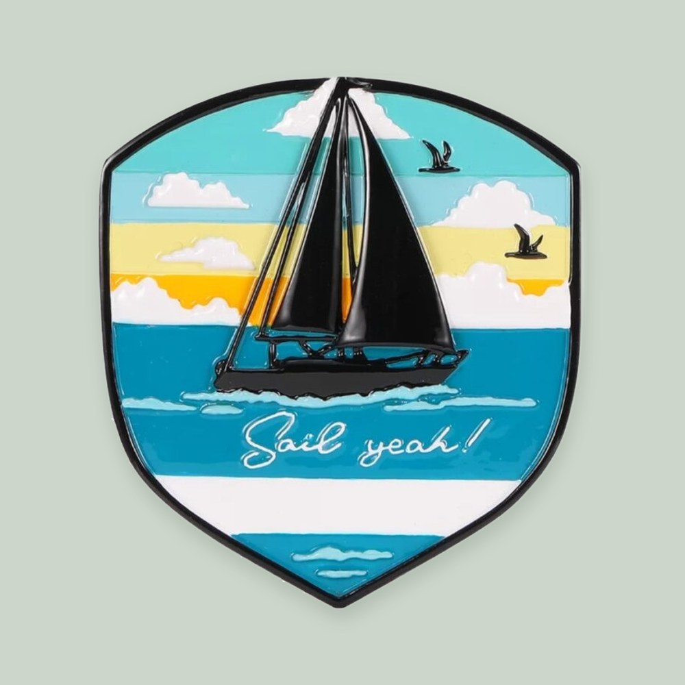 Adventure Badge Boating ornament on a sage green background