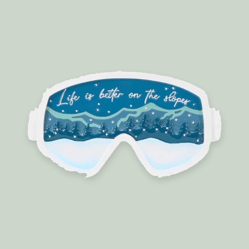 Ski Goggles ornament on a sage green background