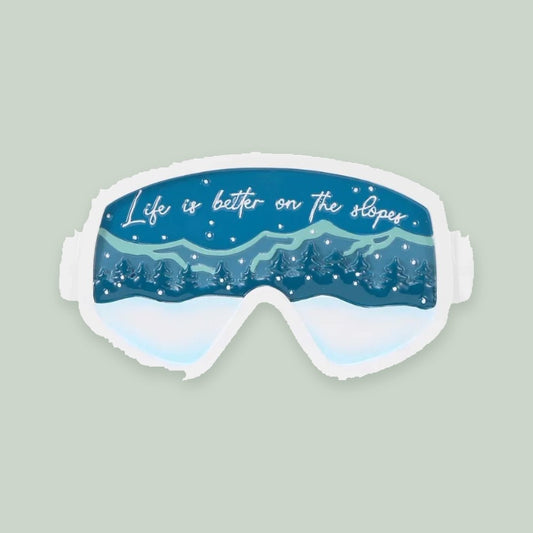 Ski Goggles ornament on a sage green background