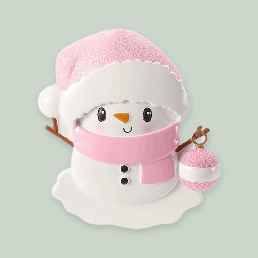Baby Snowman — Pink ornament on a sage green background