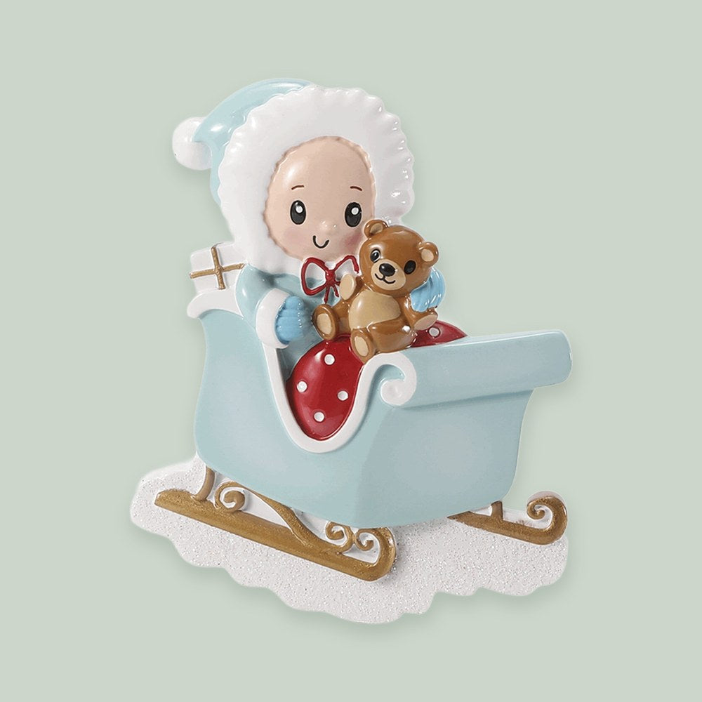 Baby in Sleigh — Blue ornament on a sage green background