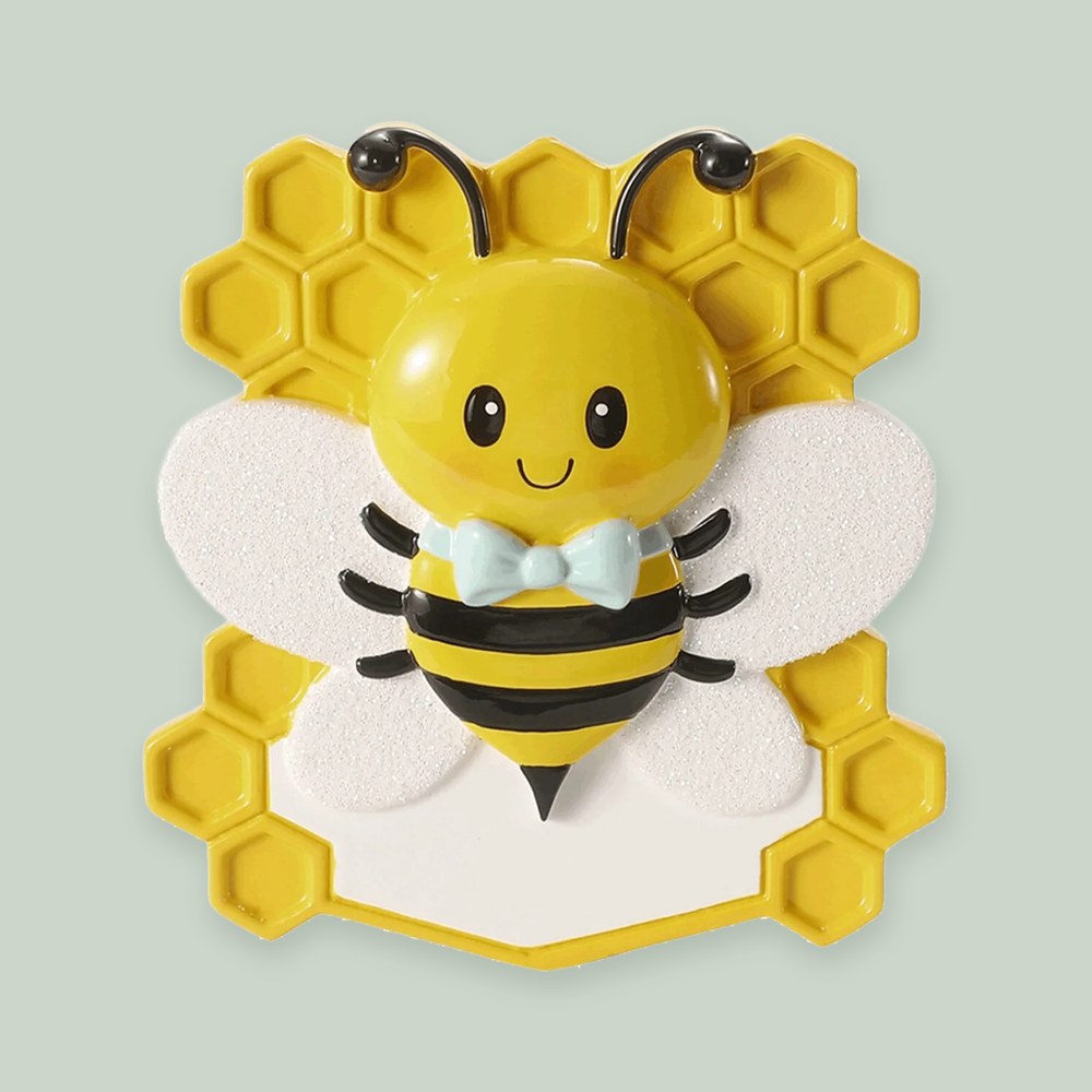 Baby Bee with Bow Tie ornament on a sage green background