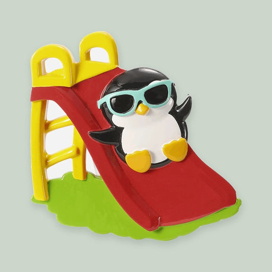 Playground Pudgy Penguin ornament on a sage green background