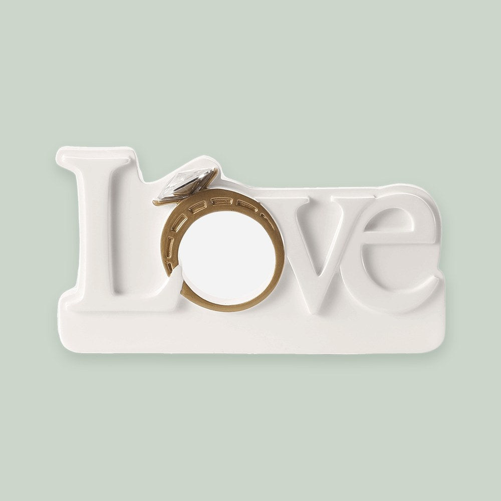 Love with Engagement Ring ornament on a sage green background