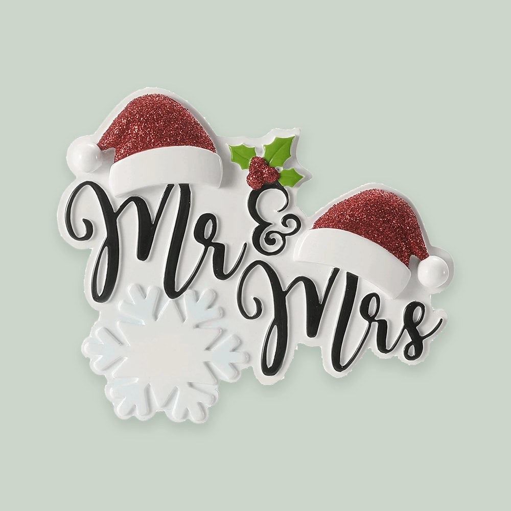 Mr. and Mrs. Santa Hats ornament on a sage green background