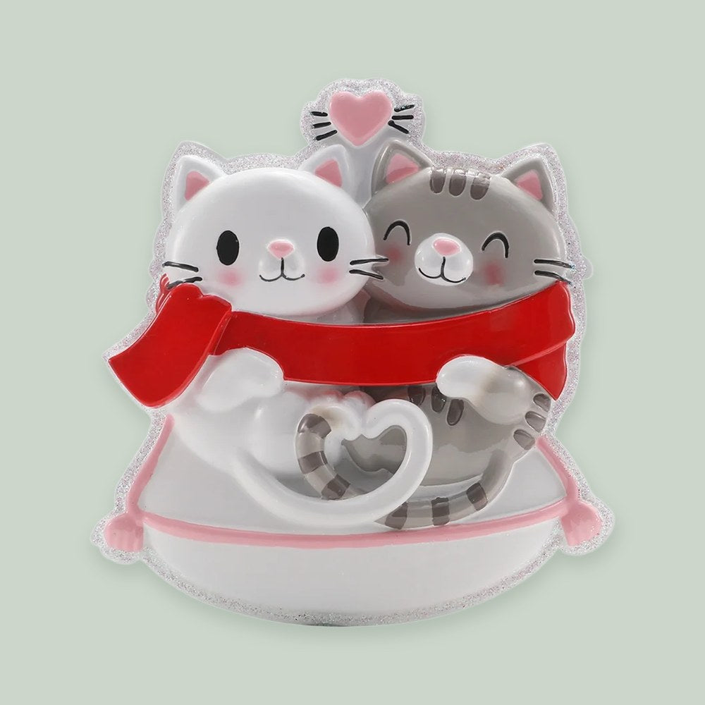 Cat Couple ornament on a sage green background